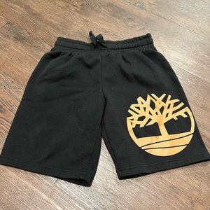 Kids size 8 (small) Timberland black sweatsuit material shorts.  Drawstring.